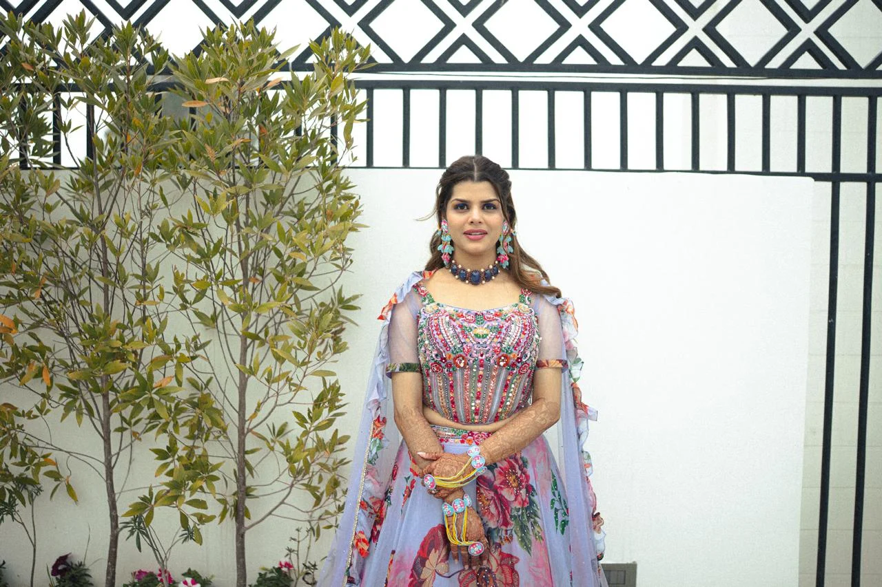 Bride portrait in pastel mehendi attire